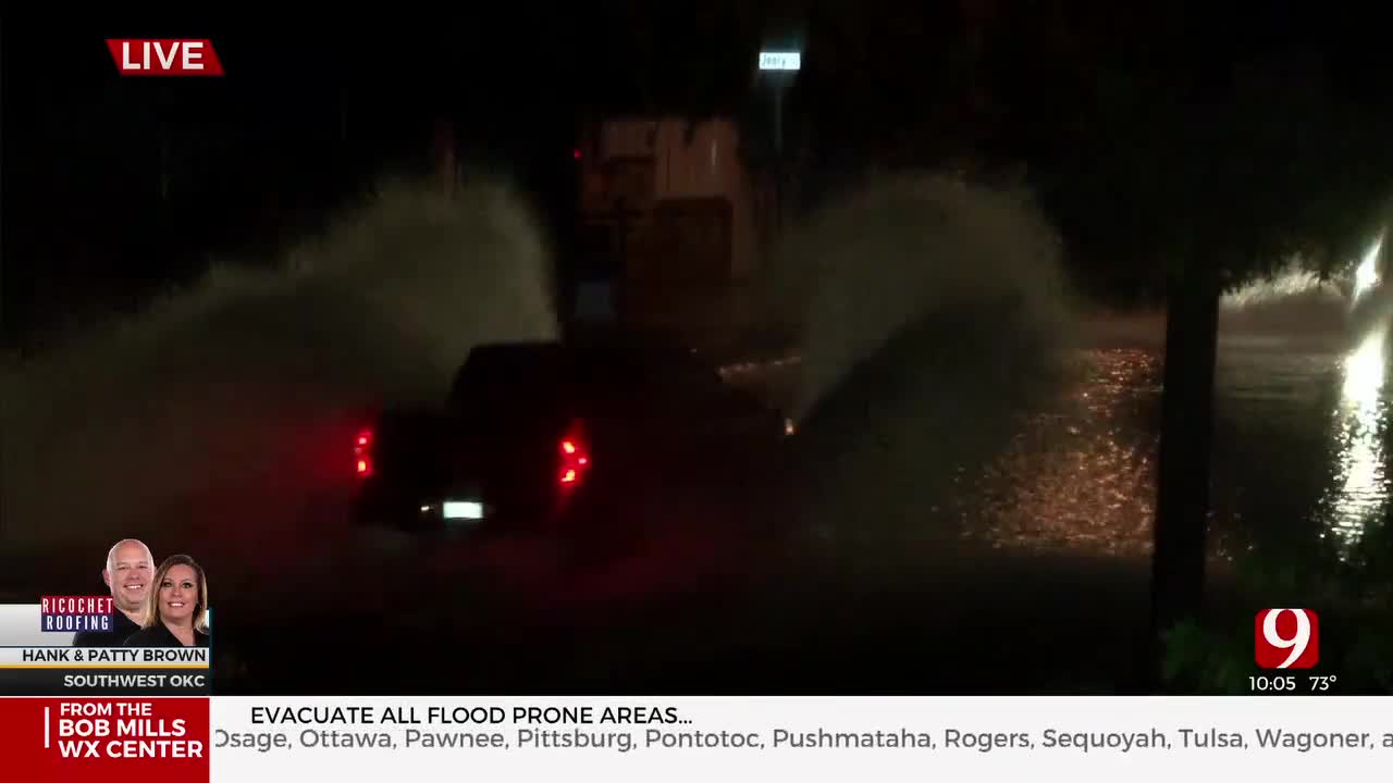 truck driving through water