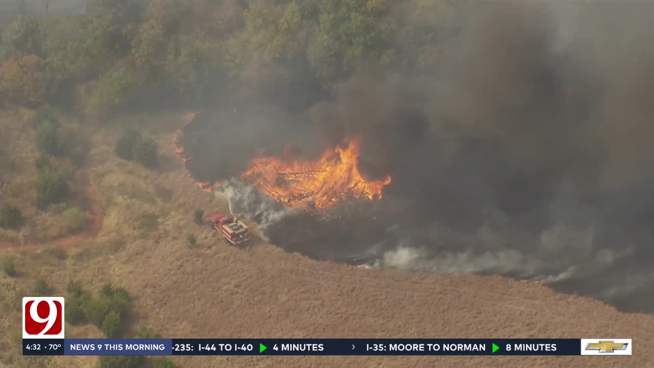 Evacuation order lifted, Logan Co. firefighters stand down after containing devastating fire