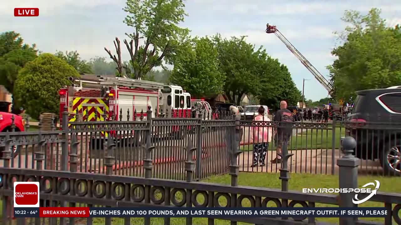 Firefighters work to extinguish Moore house fire
