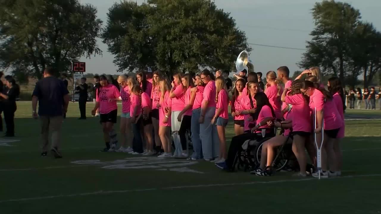 Minco dedicates Friday night football game to recovering softball team