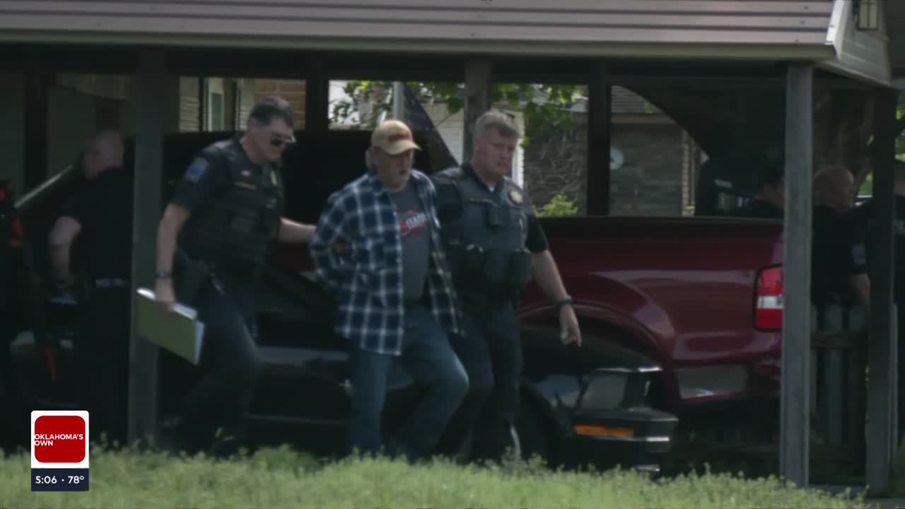 Woman injured, man in custody after argument between Tulsa neighbors ends with shots fired