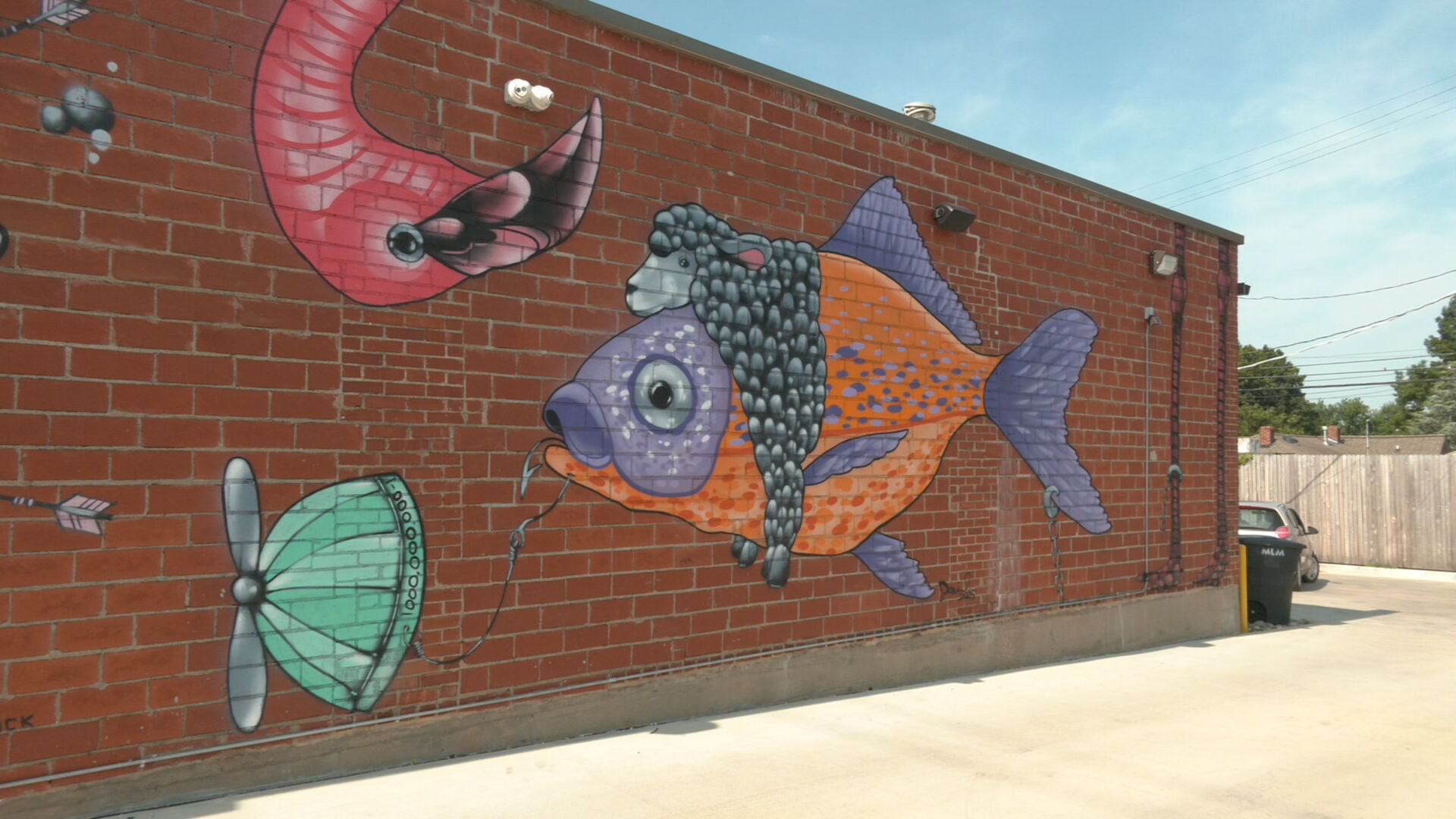 Tulsa artist paints murals to help spotlight local businesses