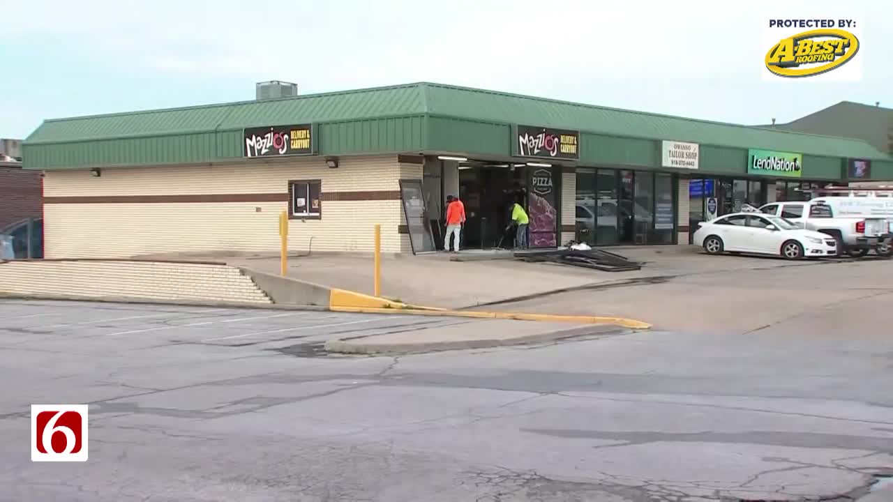 Mazzio's car backs into building in Owasso